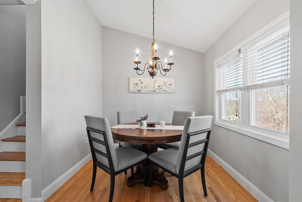 13 Boulderbrook Drive, Unit 13 Peabody, MA 01960 - Photo 9 of 41 a dining room with furniture and window
