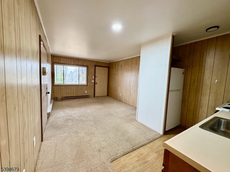 254 Clove Road, Unit G Montague, NJ 07827 - Photo 3 of 14 a view of an empty room and window