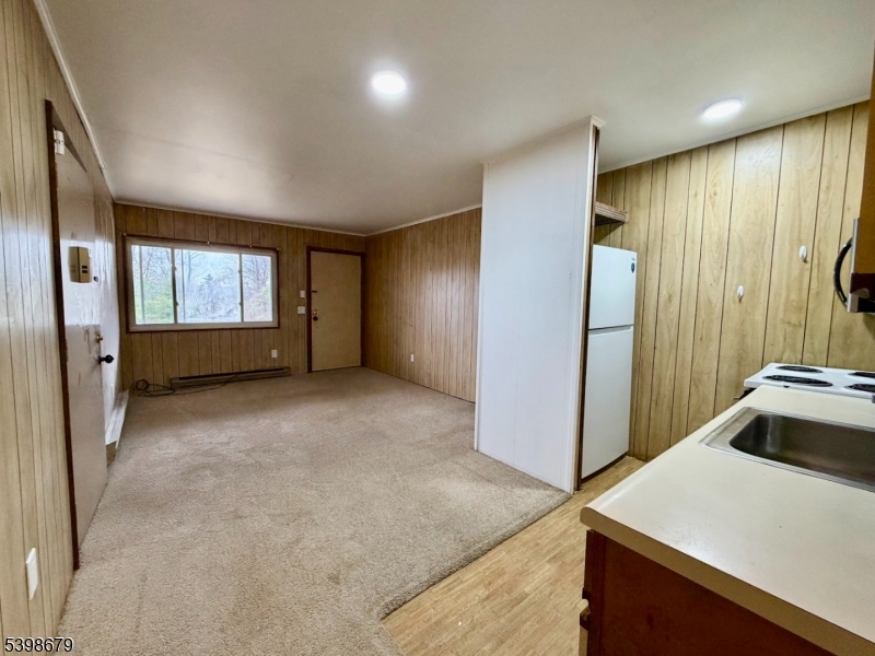 254 Clove Road, Unit G Montague, NJ 07827 - Photo 4 of 14 a view of an empty room and window