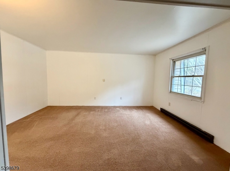 254 Clove Road, Unit G Montague, NJ 07827 - Photo 7 of 14 an empty room with windows