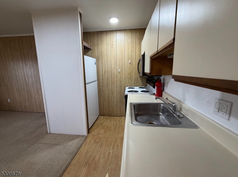 254 Clove Road, Unit G Montague, NJ 07827 - Photo 8 of 14 a bathroom with a sink and a mirror