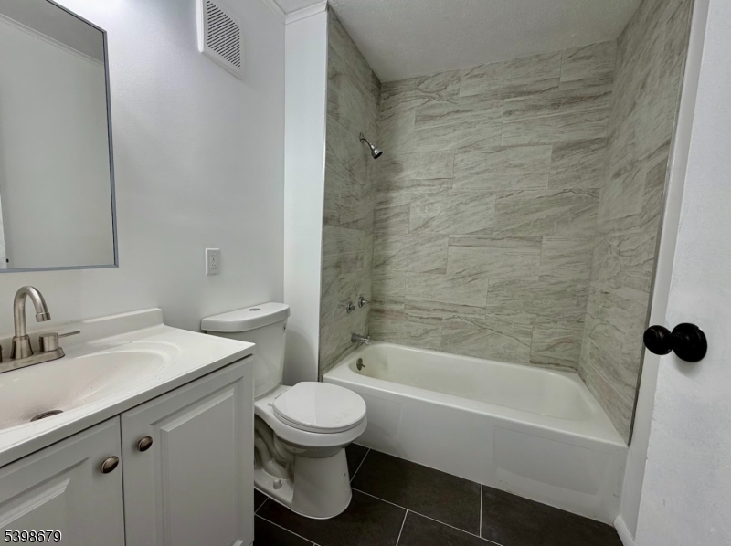 254 Clove Road, Unit G Montague, NJ 07827 - Photo 9 of 14 a bathroom with a toilet sink and bathtub