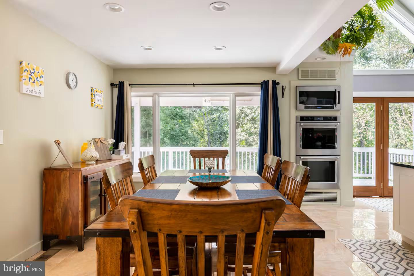 19319 Harmony Church Road Leesburg, VA 20175 - Photo 19 of 65 a dining room with furniture window and wooden floor