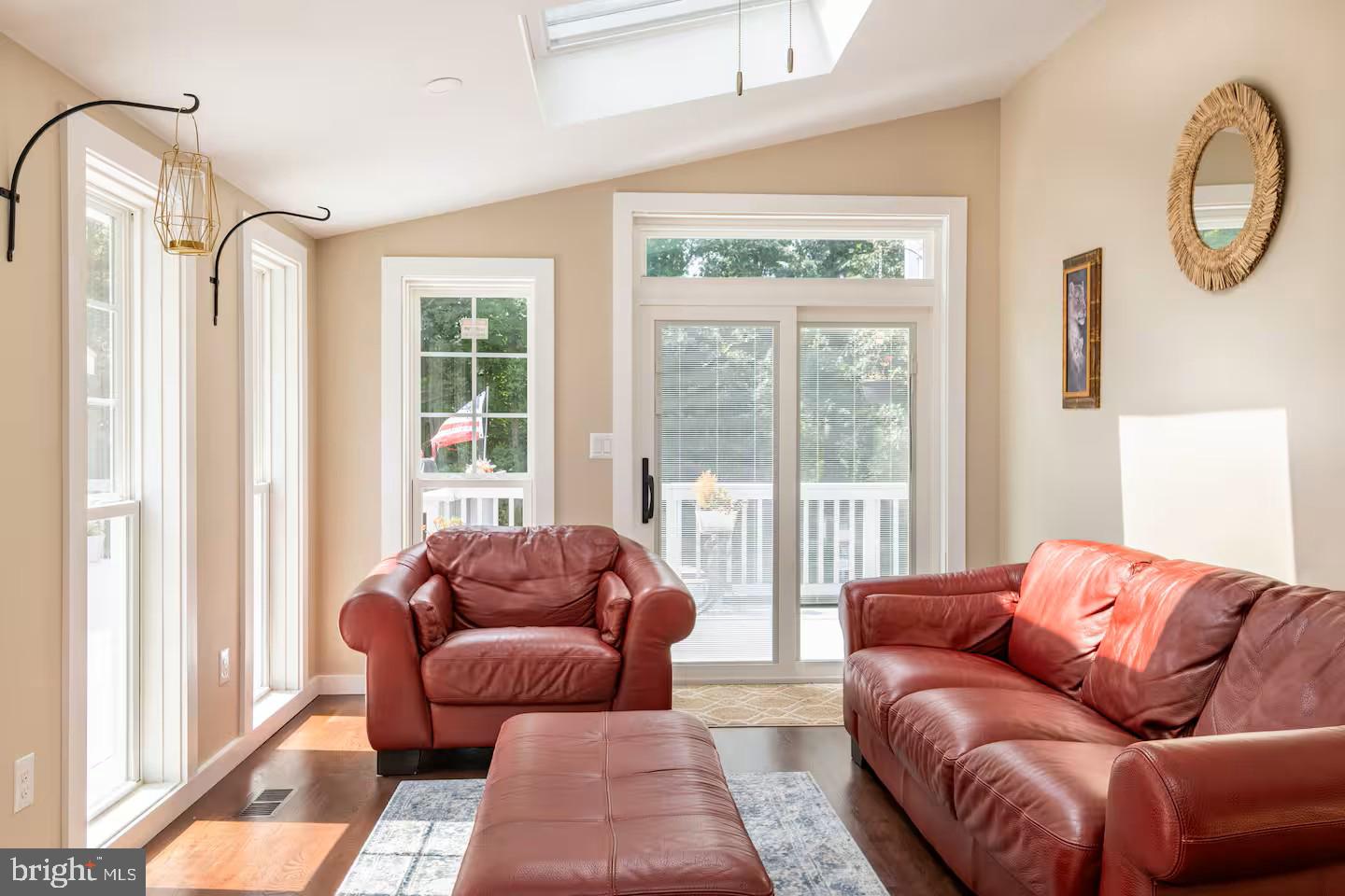 19319 Harmony Church Road Leesburg, VA 20175 - Photo 20 of 65 a living room with furniture and a large window