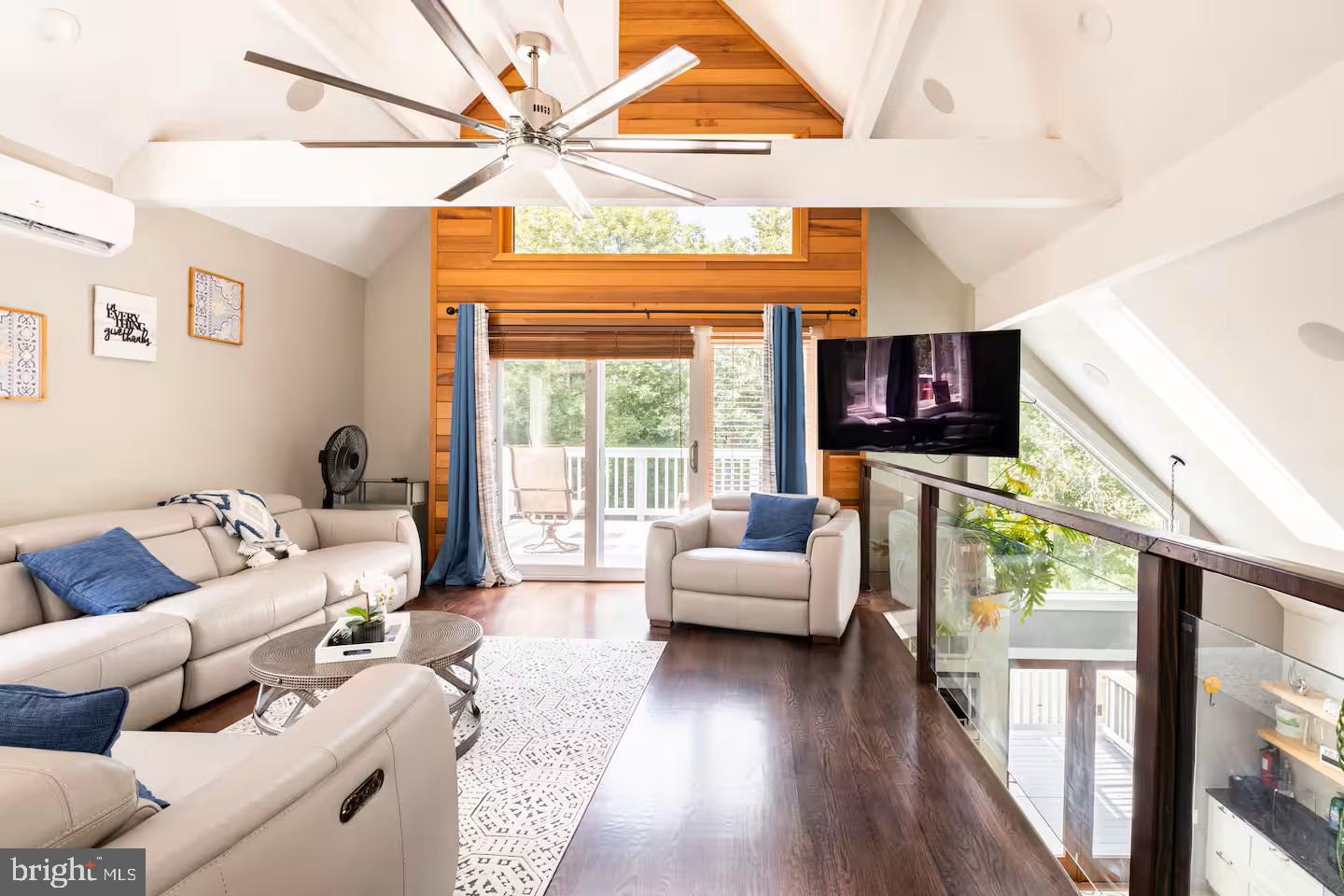 19319 Harmony Church Road Leesburg, VA 20175 - Photo 22 of 65 a living room with furniture and a flat screen tv