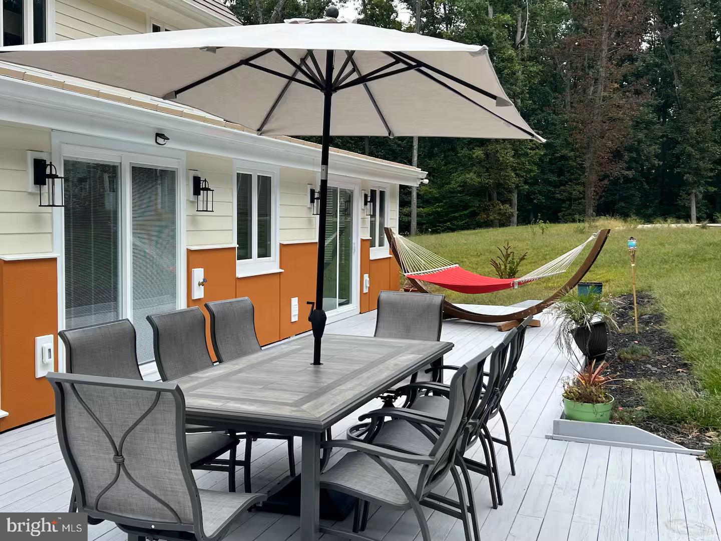 19319 Harmony Church Road Leesburg, VA 20175 - Photo 59 of 65 a table and chairs in the terrace