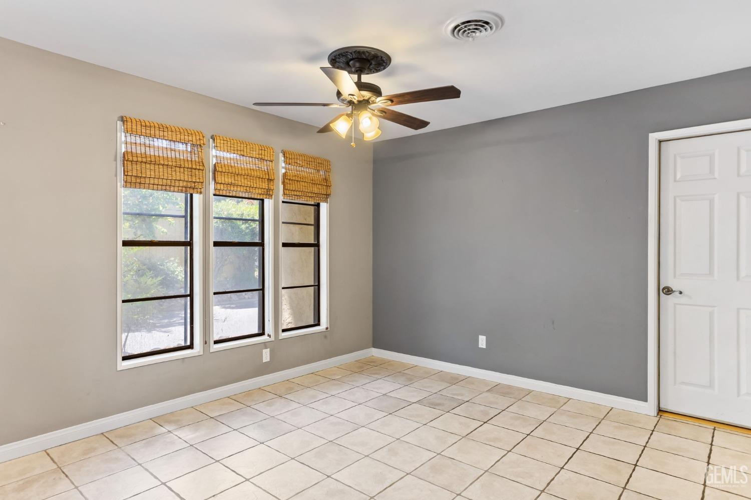 Undisclosed Address Bakersfield, CA 93306 - Photo 25 of 61 a view of an empty room with a window