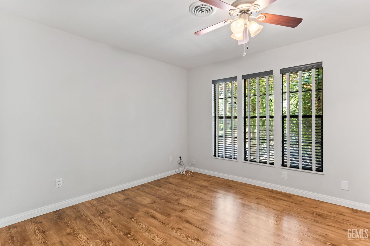 Undisclosed Address Bakersfield, CA 93306 - Photo 27 of 61 a view of an empty room with a window