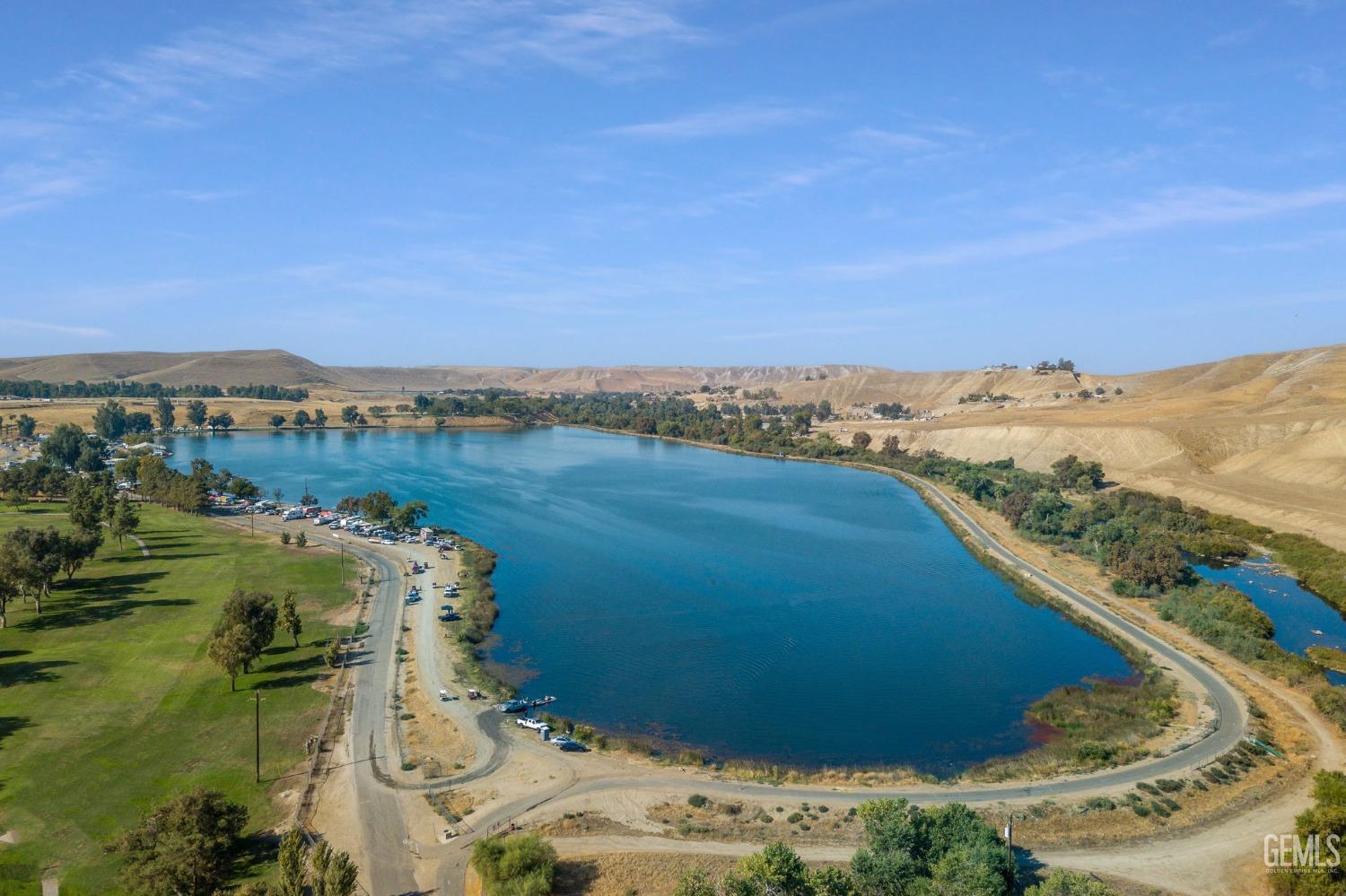 Undisclosed Address Bakersfield, CA 93306 - Photo 47 of 61 a view of a lake with a mountain
