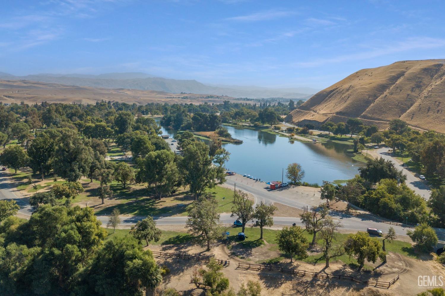 Undisclosed Address Bakersfield, CA 93306 - Photo 55 of 61 an aerial view of a house with a lake view