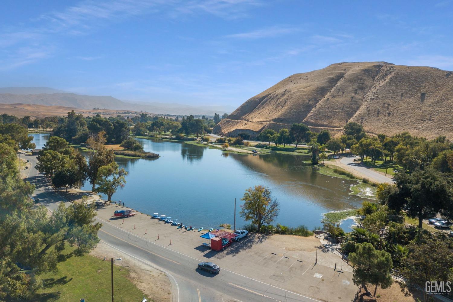 Undisclosed Address Bakersfield, CA 93306 - Photo 56 of 61 a view of a lake with a mountain in the background