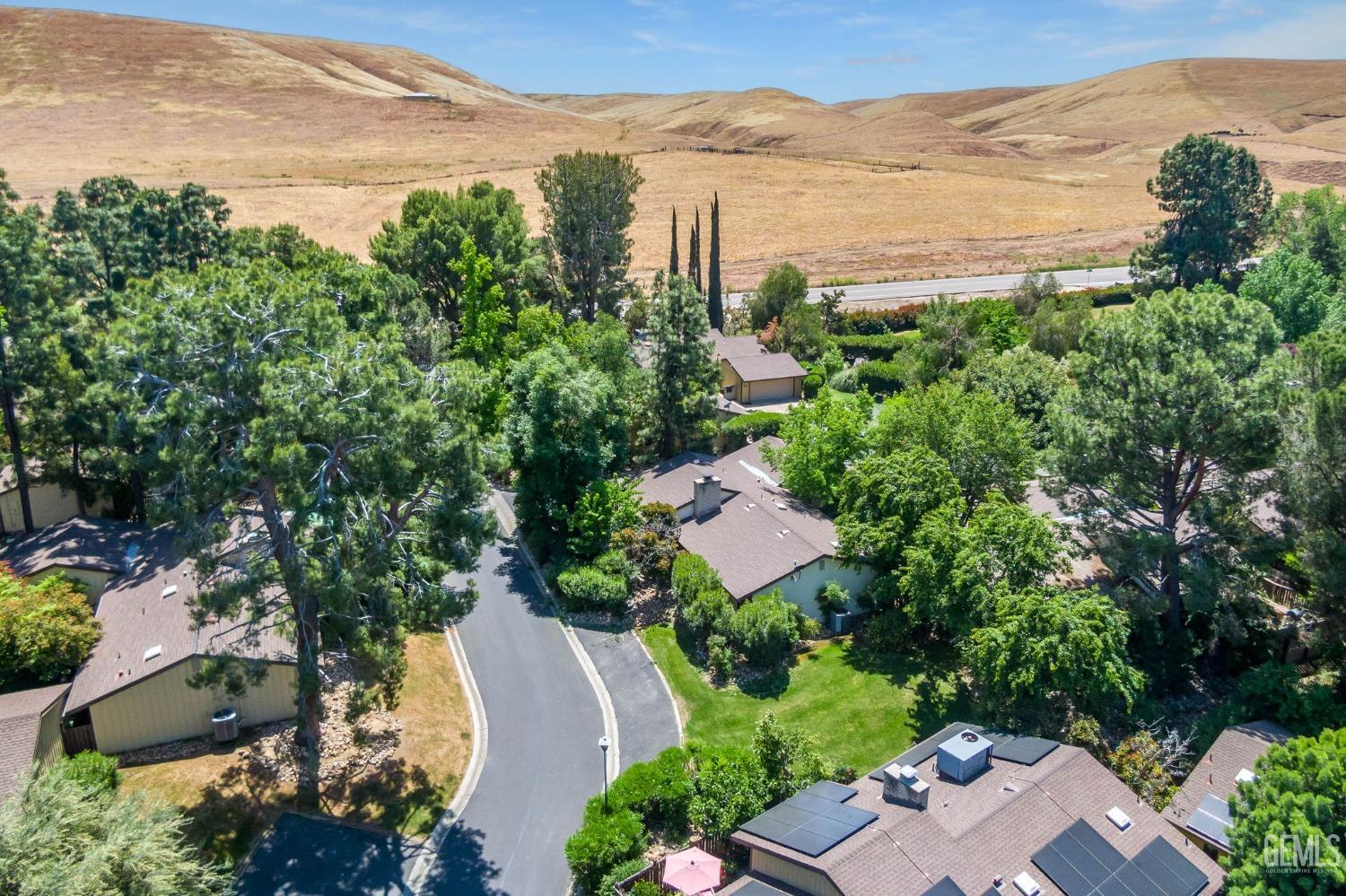 Undisclosed Address Bakersfield, CA 93306 - Photo 58 of 61 an aerial view of a house with mountain view