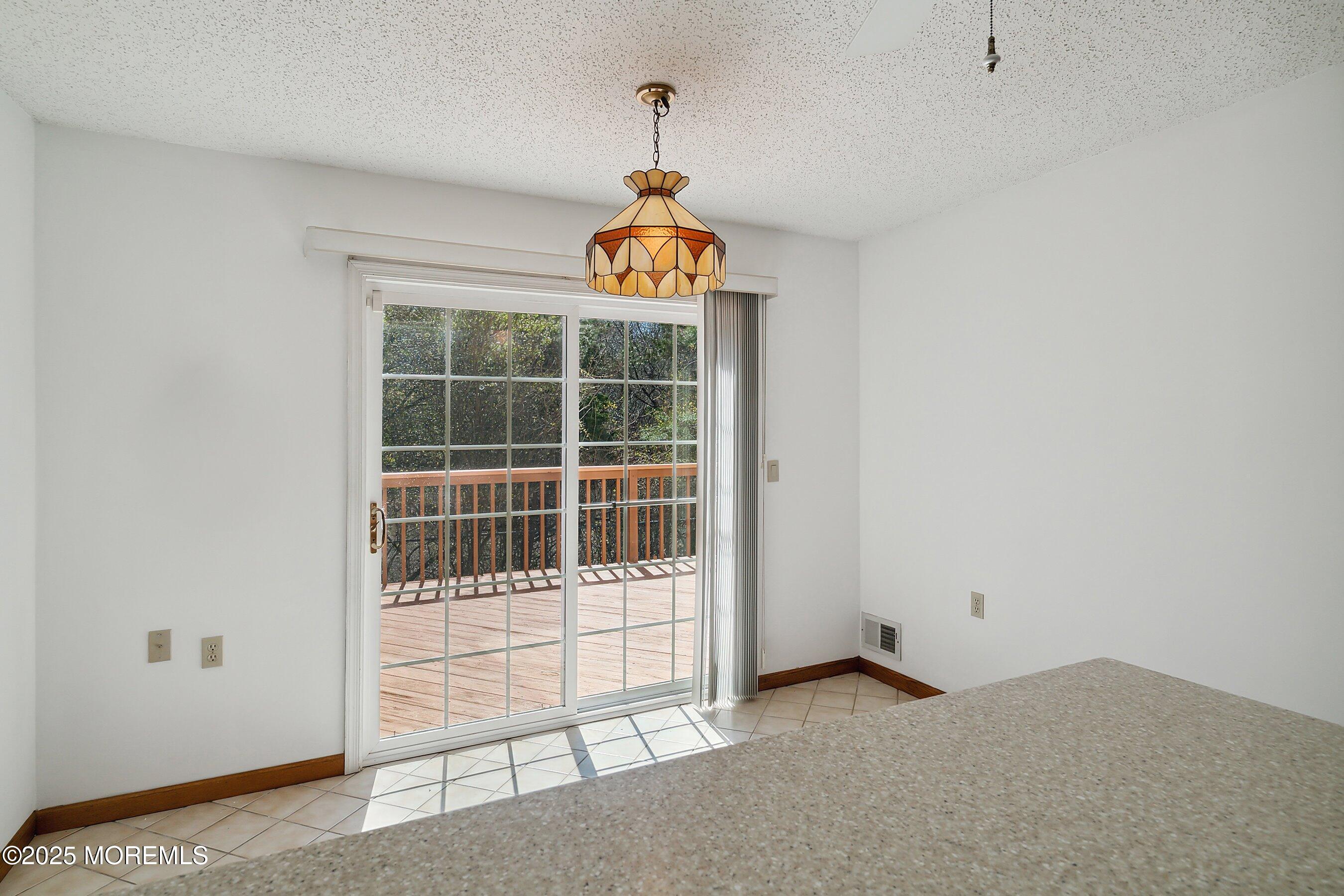 32 Pine Oak Boulevard Barnegat, NJ 08005 - Photo 15 of 40 a view of an empty room with a window