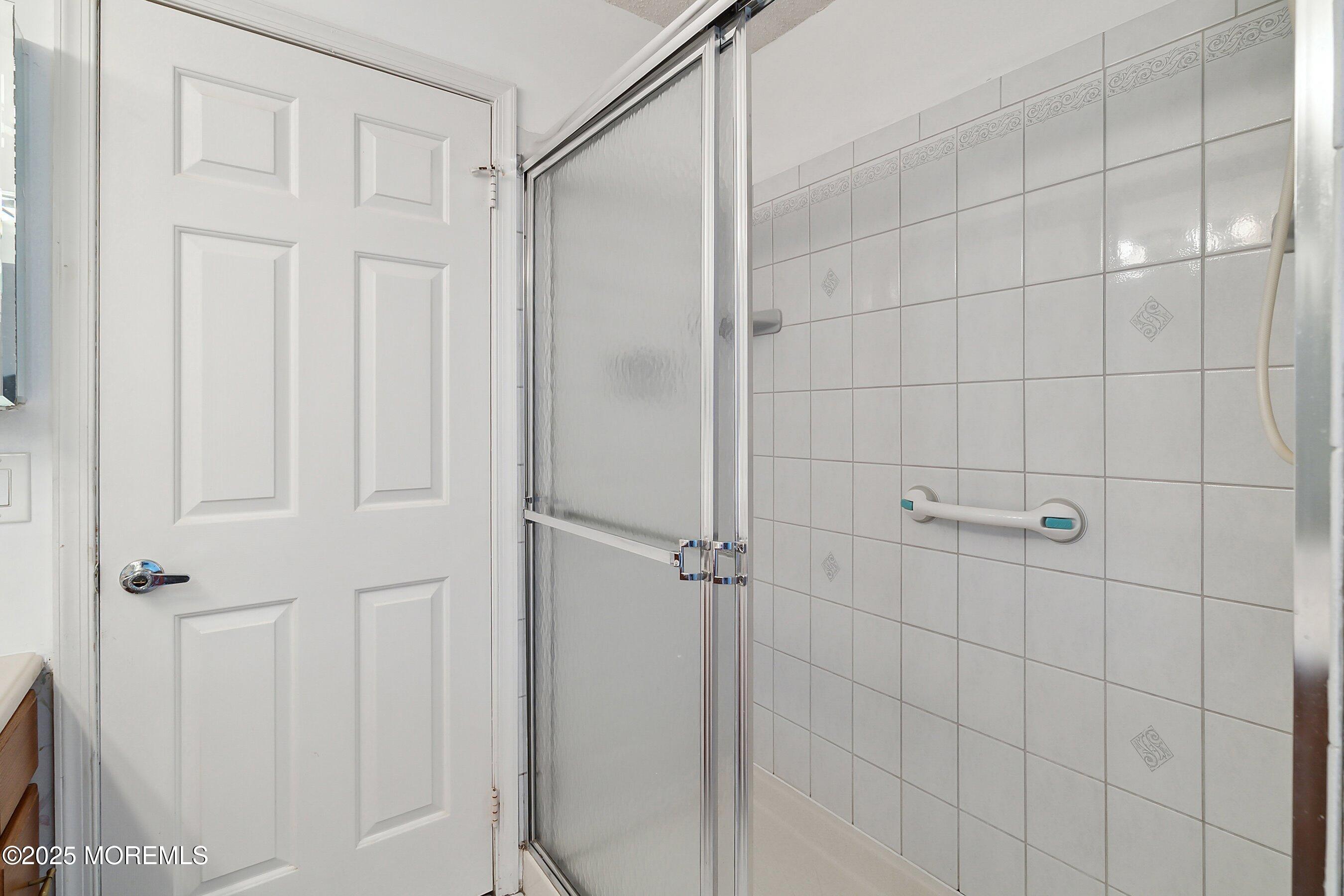 32 Pine Oak Boulevard Barnegat, NJ 08005 - Photo 24 of 40 a bathroom with a shower