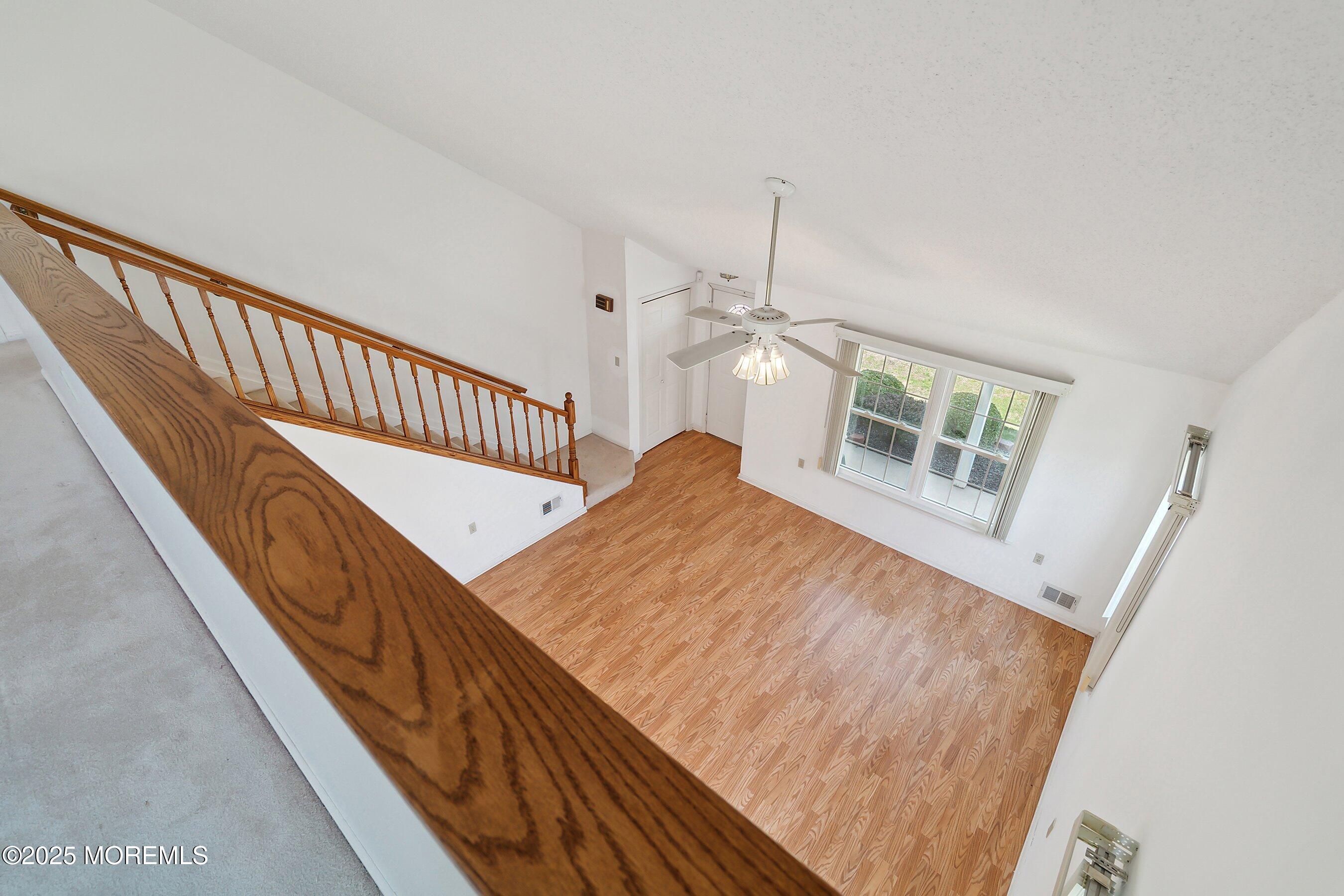 32 Pine Oak Boulevard Barnegat, NJ 08005 - Photo 26 of 40 a view of staircase with railing and a chandelier