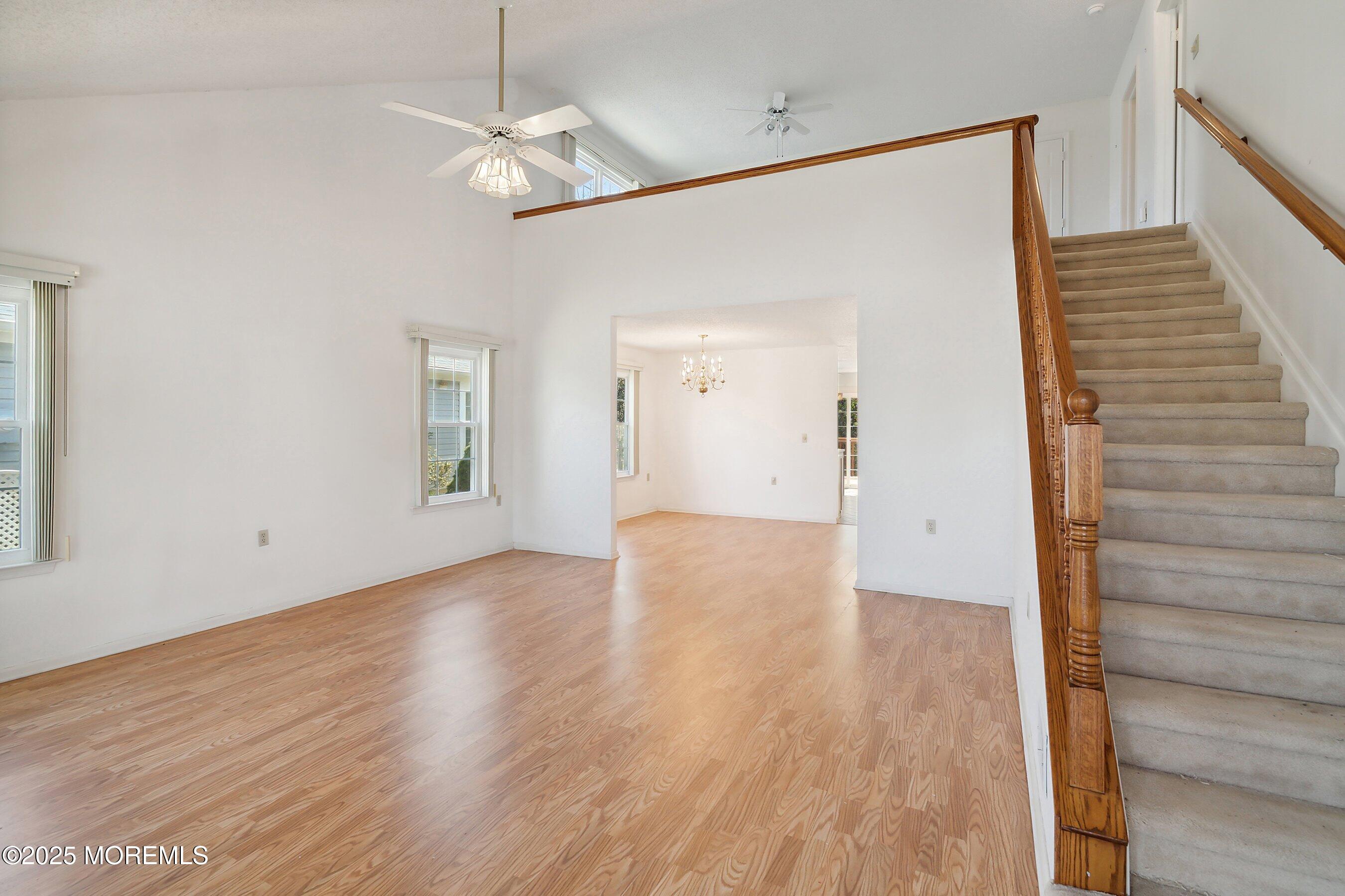 32 Pine Oak Boulevard Barnegat, NJ 08005 - Photo 3 of 40 a view of a room with wooden floor and white walls