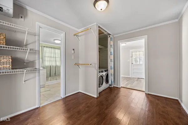 a view of a storage & utility room with washer and dryer