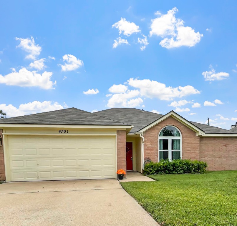4701 High Pointe Drive Temple, TX 76502 - Photo 2 of 10 Single story home featuring brick siding, concrete driveway, a front lawn, and roof with shingles
