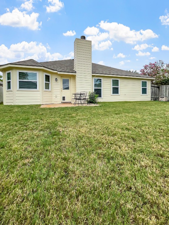 4701 High Pointe Drive Temple, TX 76502 - Photo 10 of 10 Back of property featuring a patio area, a chimney, and roof with shingles