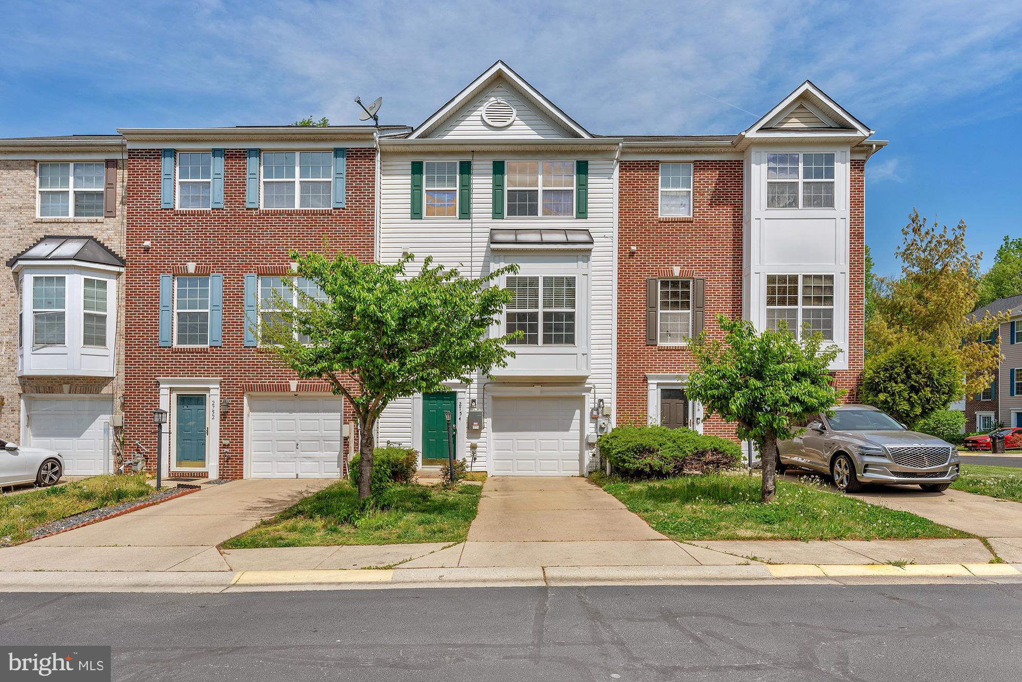 2754 Zeek Lane Lanham, MD 20706 - Photo 1 of 20 a front view of a house with garden