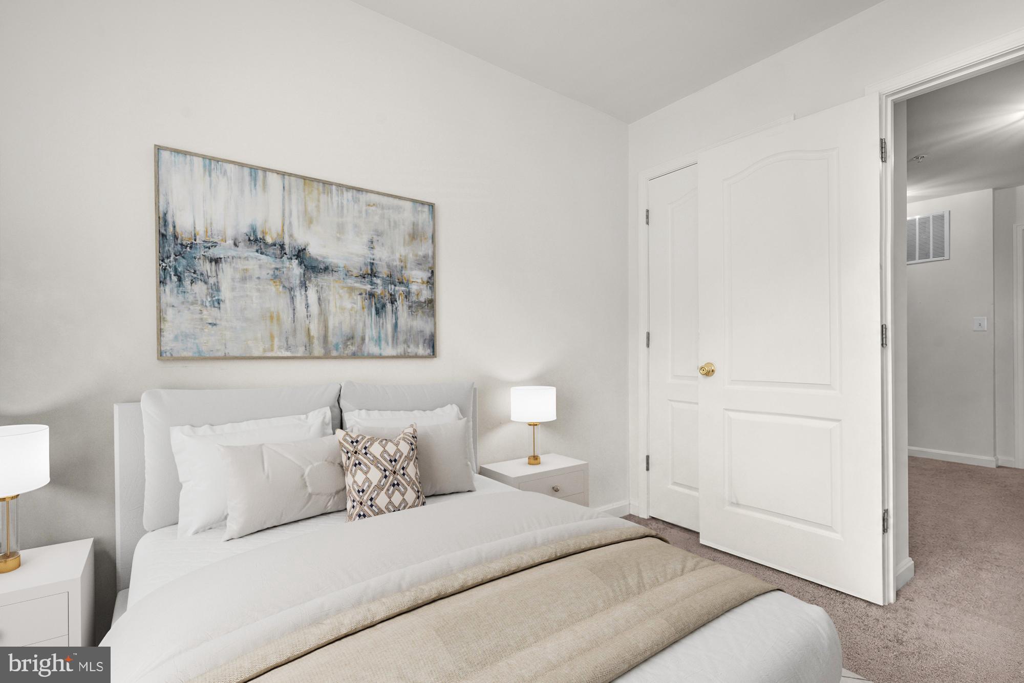 2754 Zeek Lane Lanham, MD 20706 - Photo 16 of 20 a bedroom with a bed and a painting on the wall