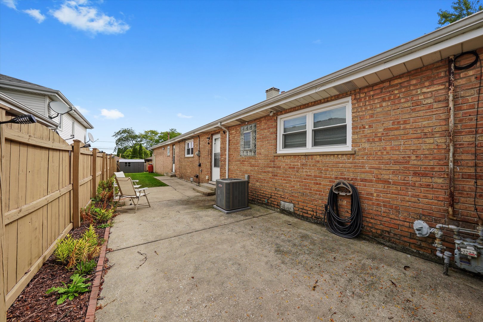 5730 West 110th Street Chicago Ridge, IL 60415 - Photo 36 of 43 a backyard of a house with seating space
