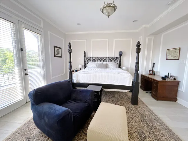 a living room with furniture and windows