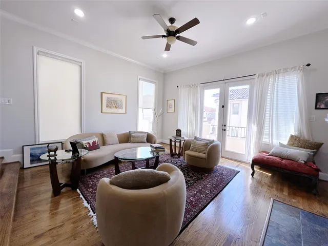 a living room with furniture or couch and a window