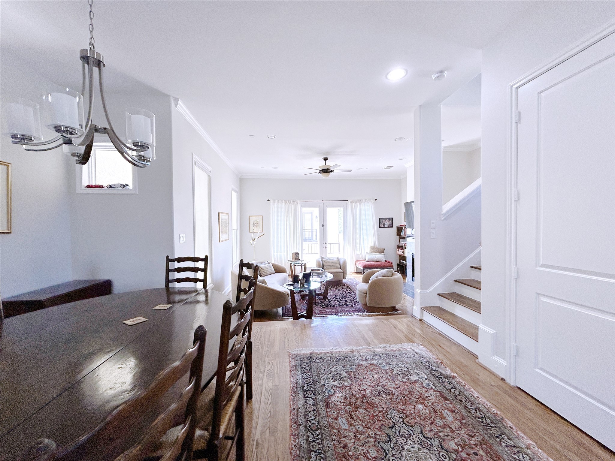 939 Queen Annes Road Houston, TX 77024 - Photo 7 of 40 a living room with furniture and wooden floor