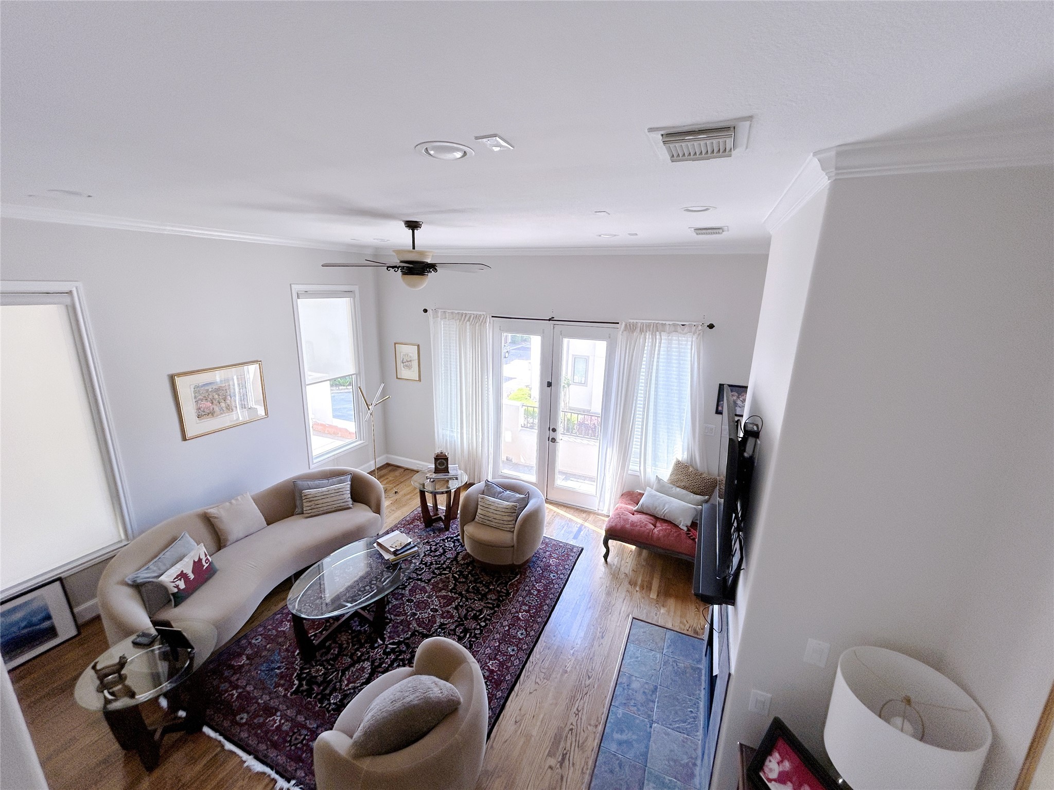 939 Queen Annes Road Houston, TX 77024 - Photo 9 of 40 a living room with furniture and a large window