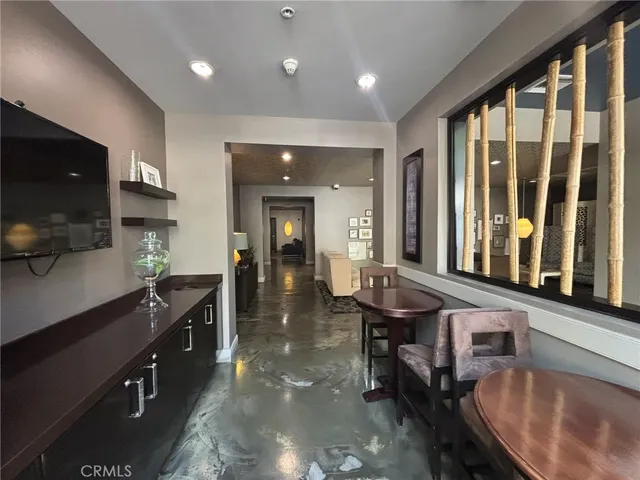 a bathroom with a sink and a large mirror