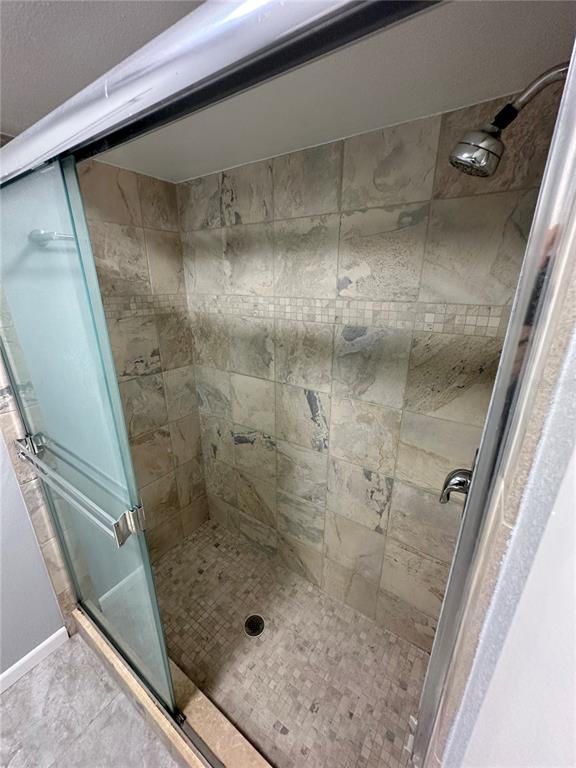 700 Starkey Road, Unit 1525 Largo, FL 33771 - Photo 21 of 46 a bathroom with a shower