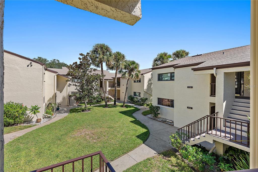 700 Starkey Road, Unit 1525 Largo, FL 33771 - Photo 36 of 46 front view of a house with a yard