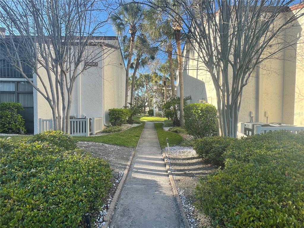 700 Starkey Road, Unit 1525 Largo, FL 33771 - Photo 44 of 46 a view of a pathway of house