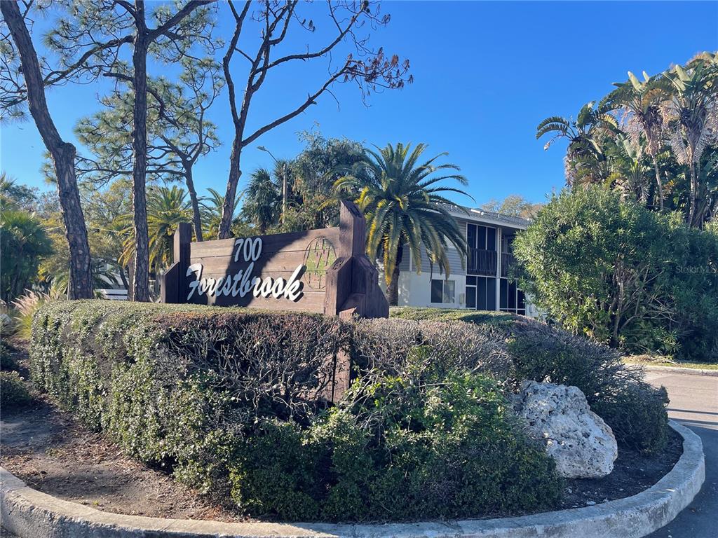 700 Starkey Road, Unit 1525 Largo, FL 33771 - Photo 46 of 46 a view of a house with a yard and tree
