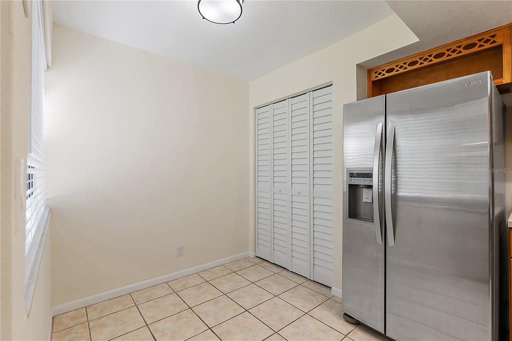 700 Starkey Road, Unit 1525 Largo, FL 33771 - Photo 8 of 46 a bathroom with a glass shower door