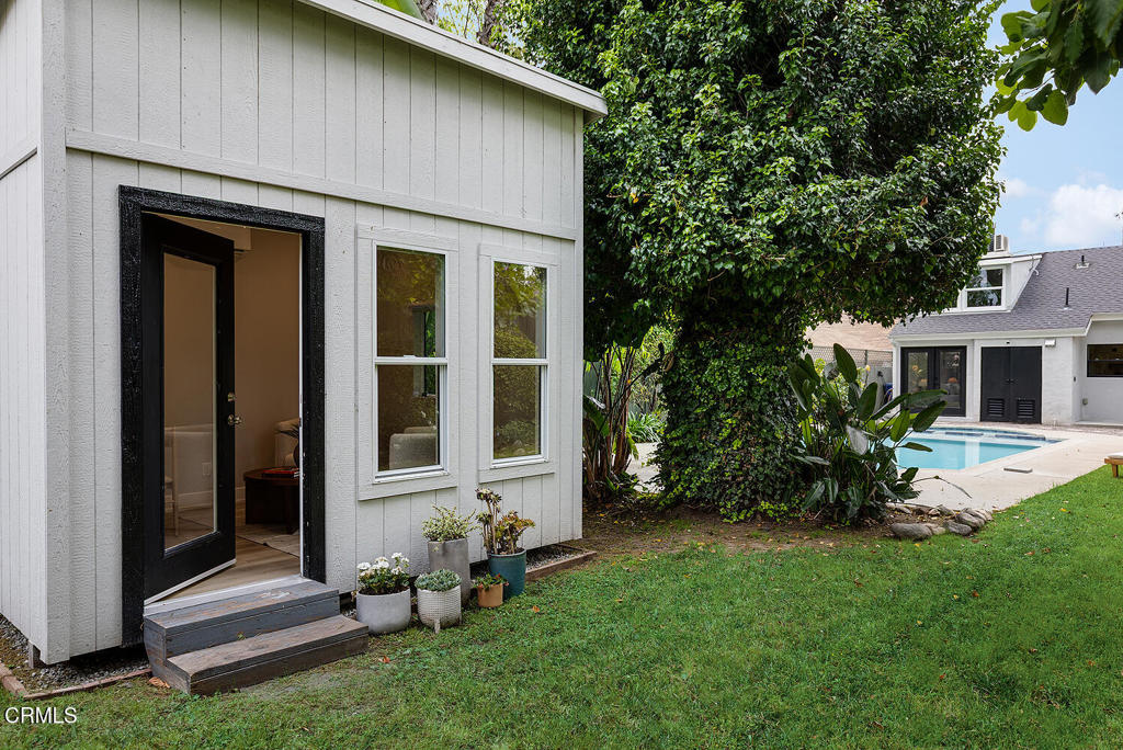 2040 North Madison Avenue Altadena, CA 91001 - Photo 29 of 35 a view of house with backyard and garden