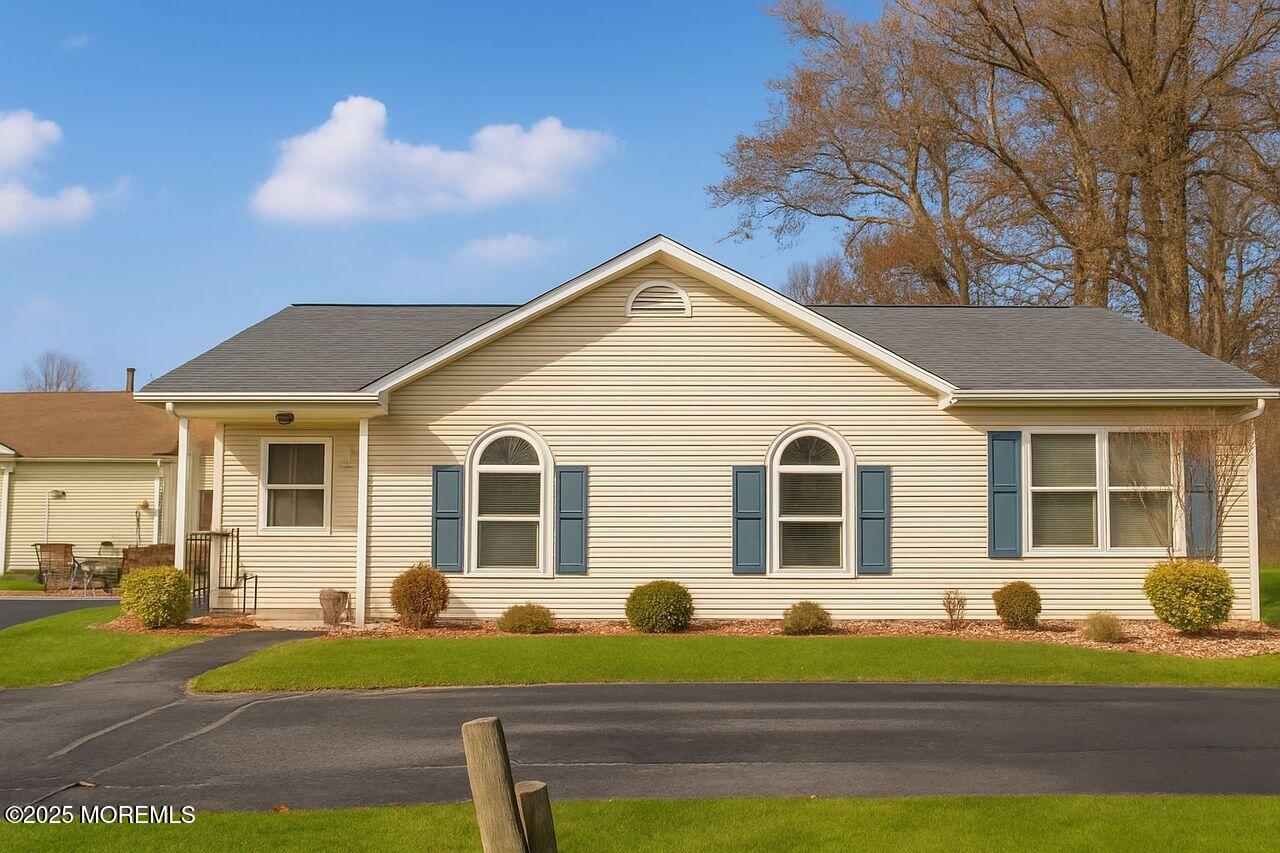 35 Ivy Ridge Close Freehold, NJ 07728 - Photo 18 of 18 a view of a yard in front of a house