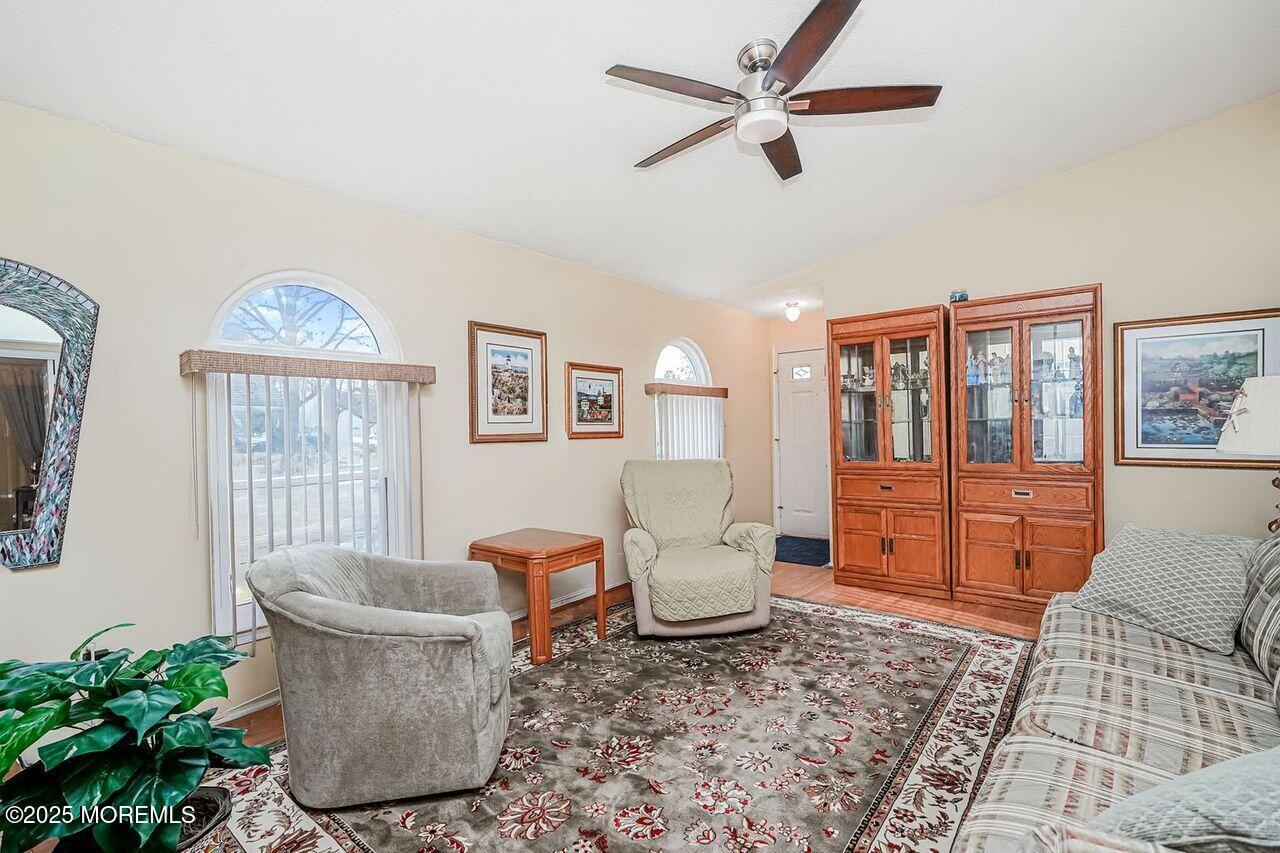 35 Ivy Ridge Close Freehold, NJ 07728 - Photo 4 of 18 a living room with furniture and a window