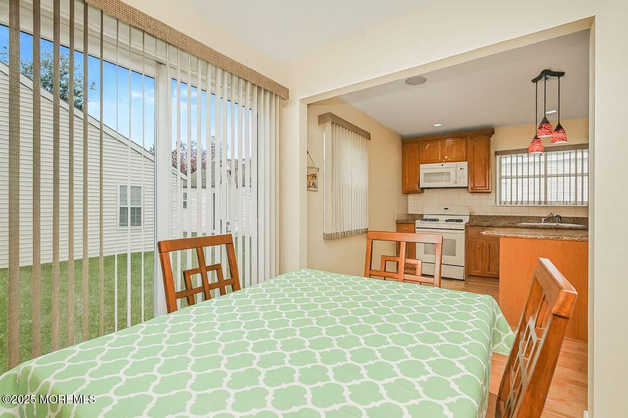 35 Ivy Ridge Close Freehold, NJ 07728 - Photo 9 of 18 a bedroom with furniture and window