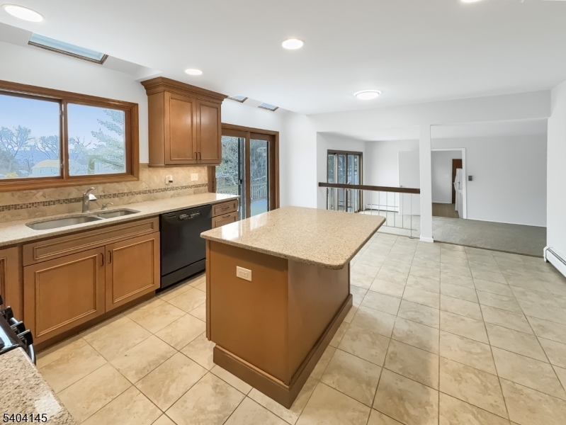 16 Knob Hill Road Hackettstown, NJ 07840 - Photo 11 of 41 a kitchen with stainless steel appliances a sink a stove a refrigerator and cabinets