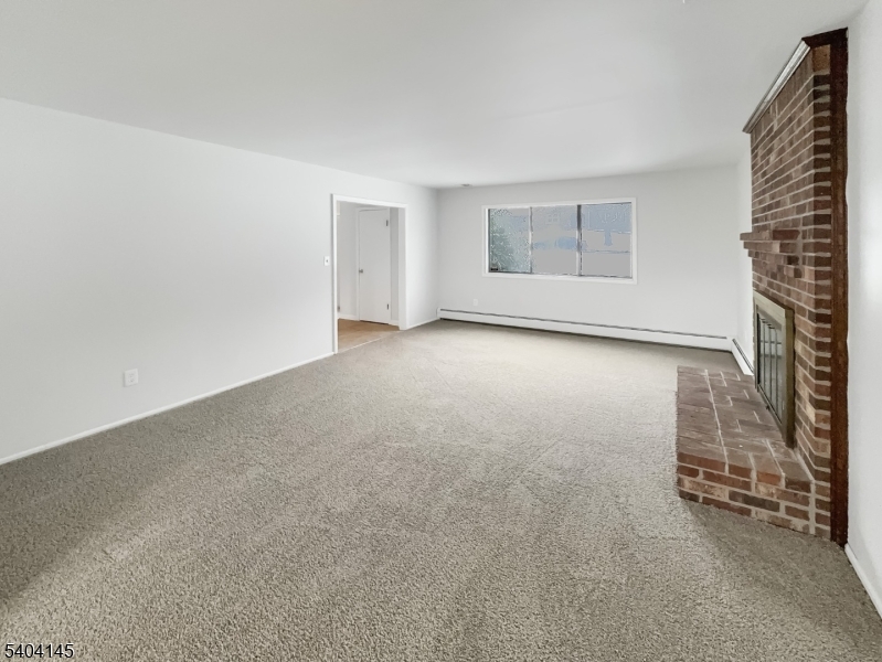 16 Knob Hill Road Hackettstown, NJ 07840 - Photo 12 of 41 an empty room with windows