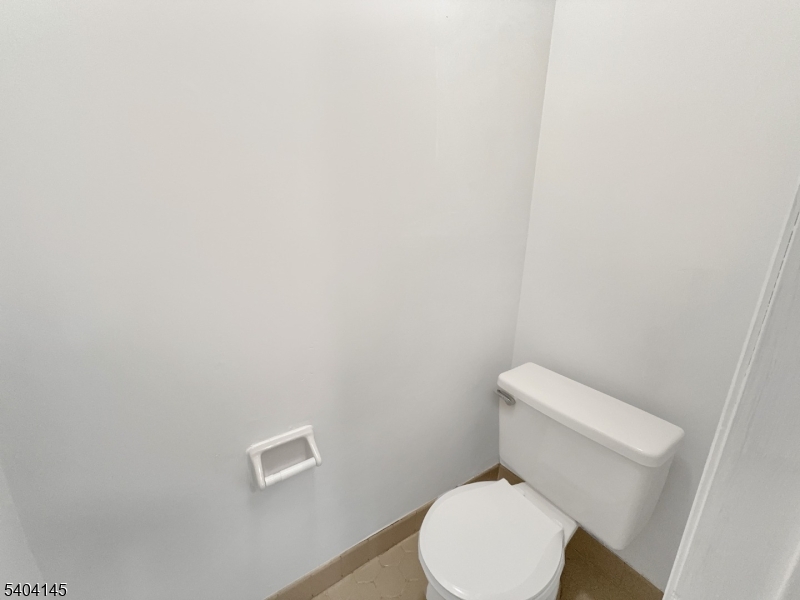16 Knob Hill Road Hackettstown, NJ 07840 - Photo 21 of 41 a white toilet sitting next to a white wall