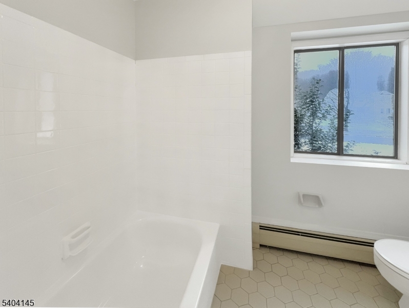 16 Knob Hill Road Hackettstown, NJ 07840 - Photo 25 of 41 a bathroom with a toilet a sink and a bathtub