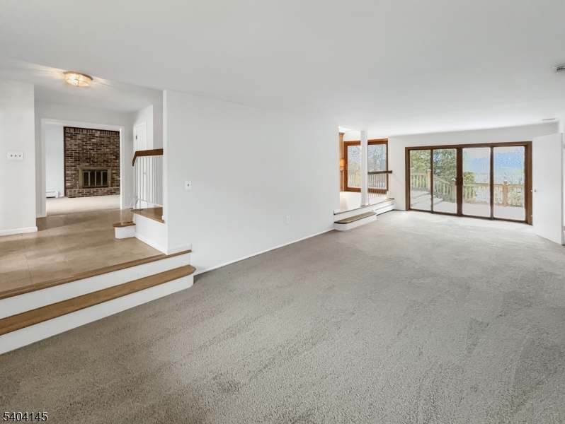 16 Knob Hill Road Hackettstown, NJ 07840 - Photo 3 of 41 an empty room with windows
