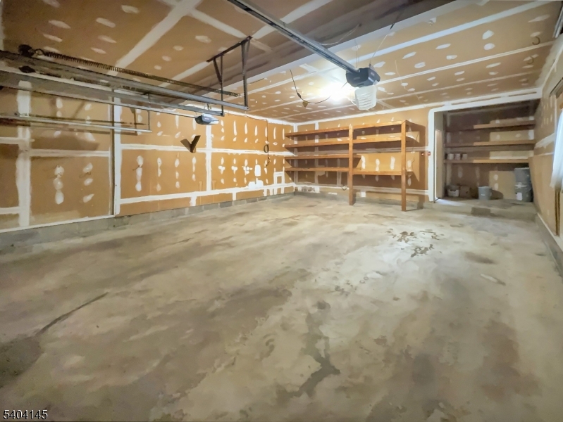 16 Knob Hill Road Hackettstown, NJ 07840 - Photo 32 of 41 a view of an empty room with wooden floor