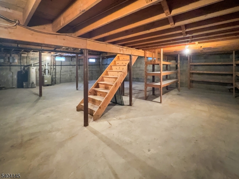16 Knob Hill Road Hackettstown, NJ 07840 - Photo 36 of 41 a view of an empty room with stairs