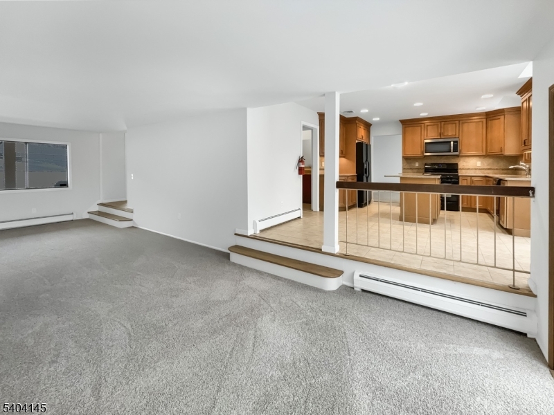 16 Knob Hill Road Hackettstown, NJ 07840 - Photo 8 of 41 a view of kitchen with furniture and refrigerator