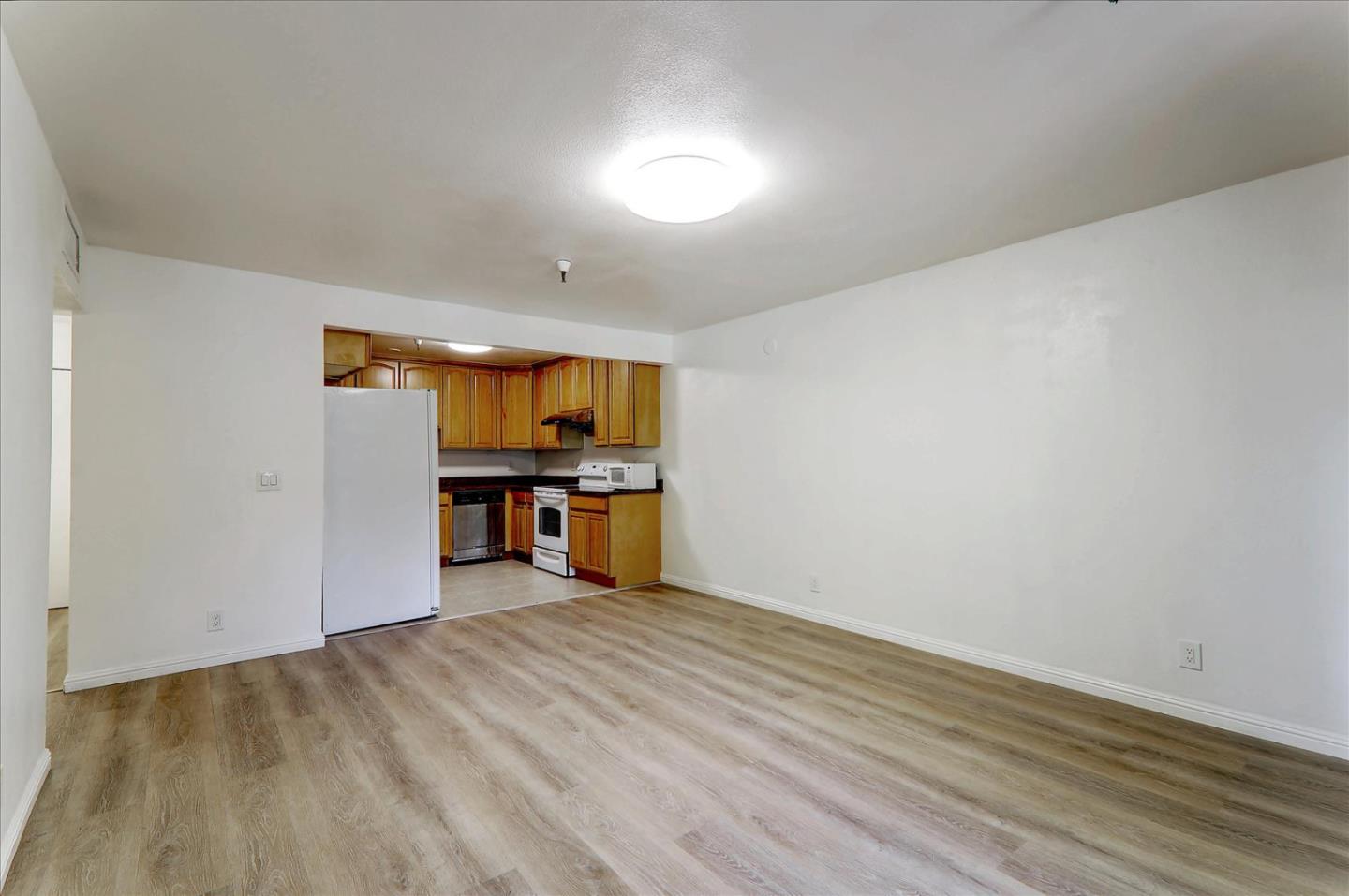 1775 Panda Way, Unit 103 Hayward, CA 94541 - Photo 16 of 33 a view of kitchen with wooden floor