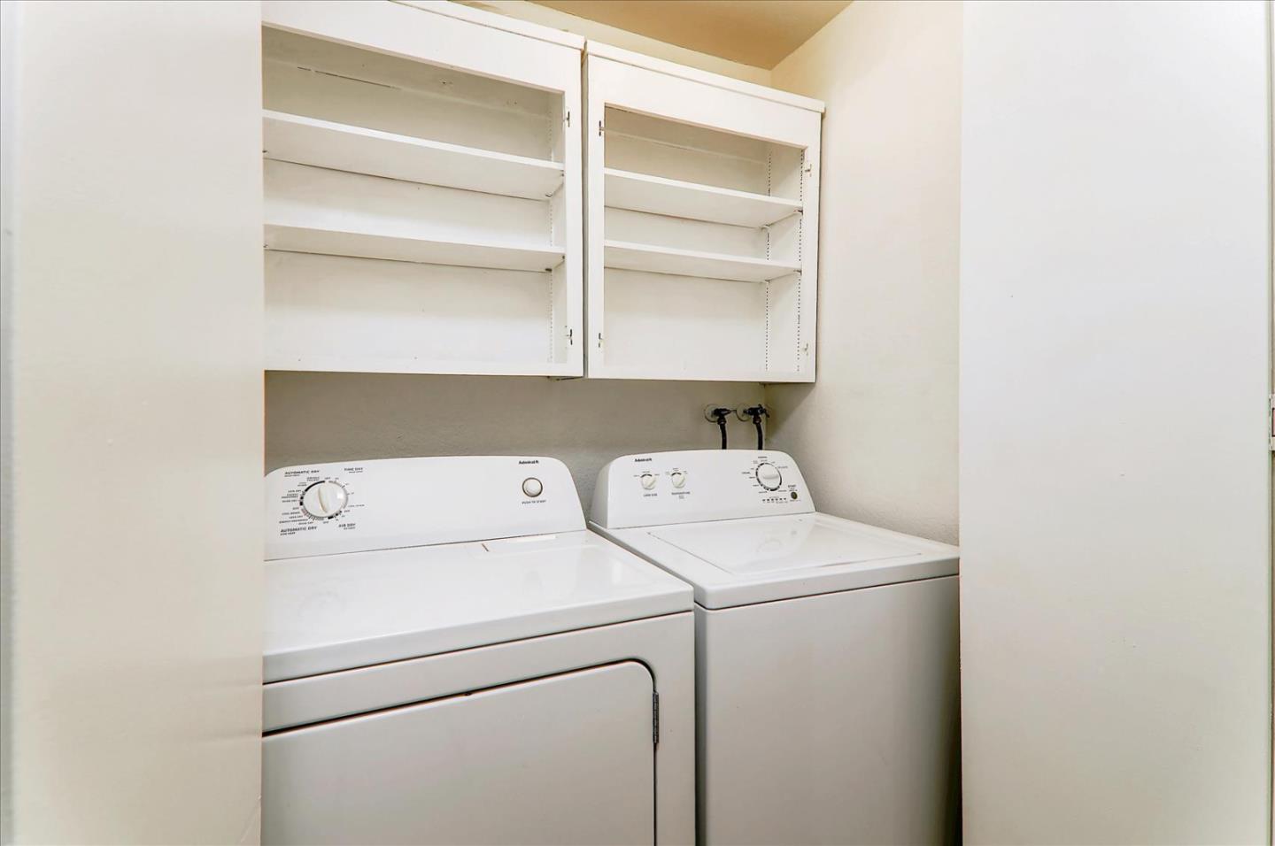 1775 Panda Way, Unit 103 Hayward, CA 94541 - Photo 27 of 33 a utility room with dryer and washer